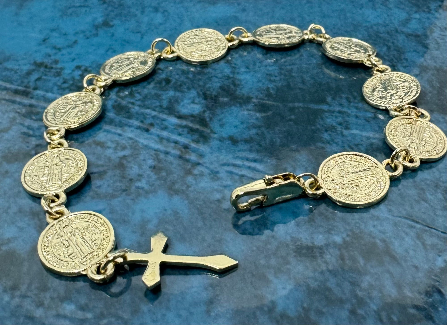 Gold San Benito and Crucifix Charm Bracelet